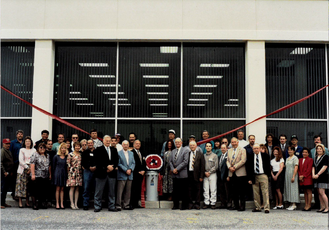 Pictured: 1994 photo of Sussex Rural Electric Cooperative’s staff and board of directors at the ribbon-cutting for their new office.