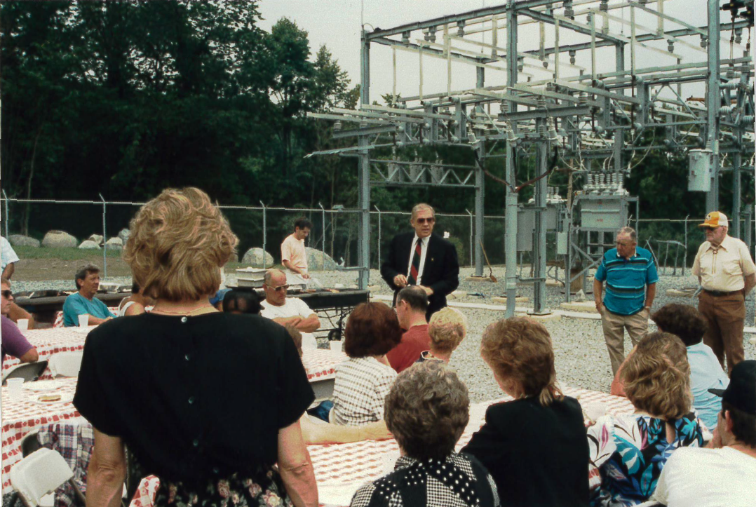 Pictured: SREC employees gather together in the newly constructed Vernon substation for a company picnic.