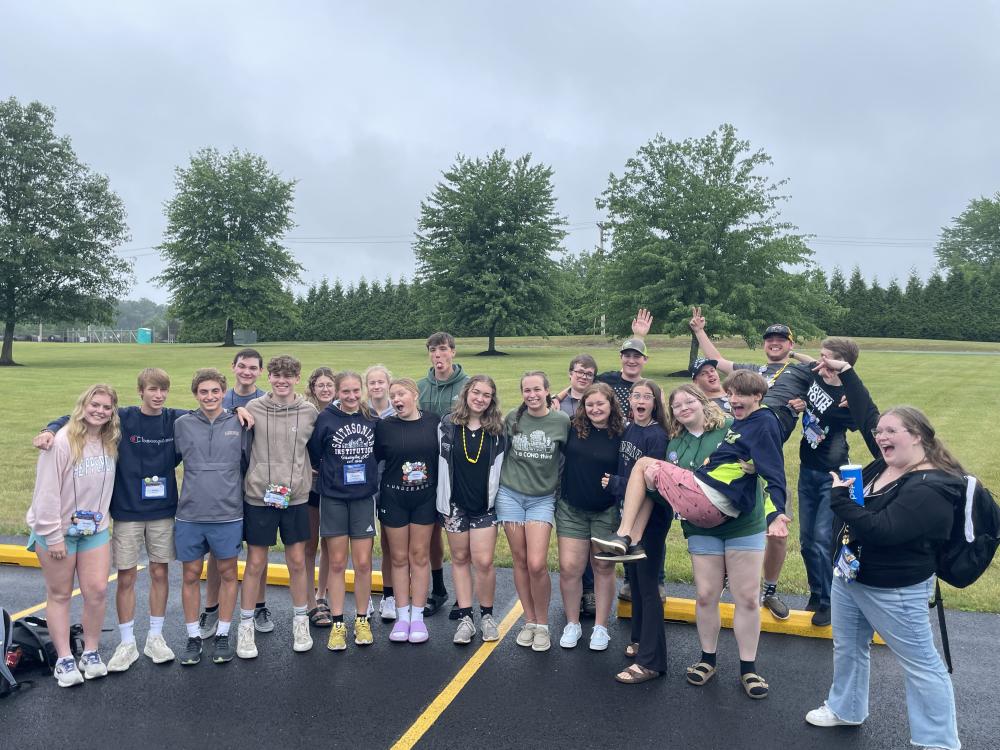 A large group of students participating in 2023's Youth Tour trip pose together before heading home