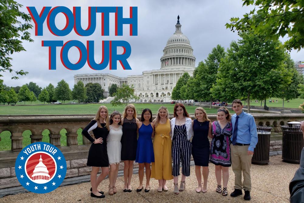 Students standing in front of the US Capitol Building as part of the Rural Electric Youth Tour