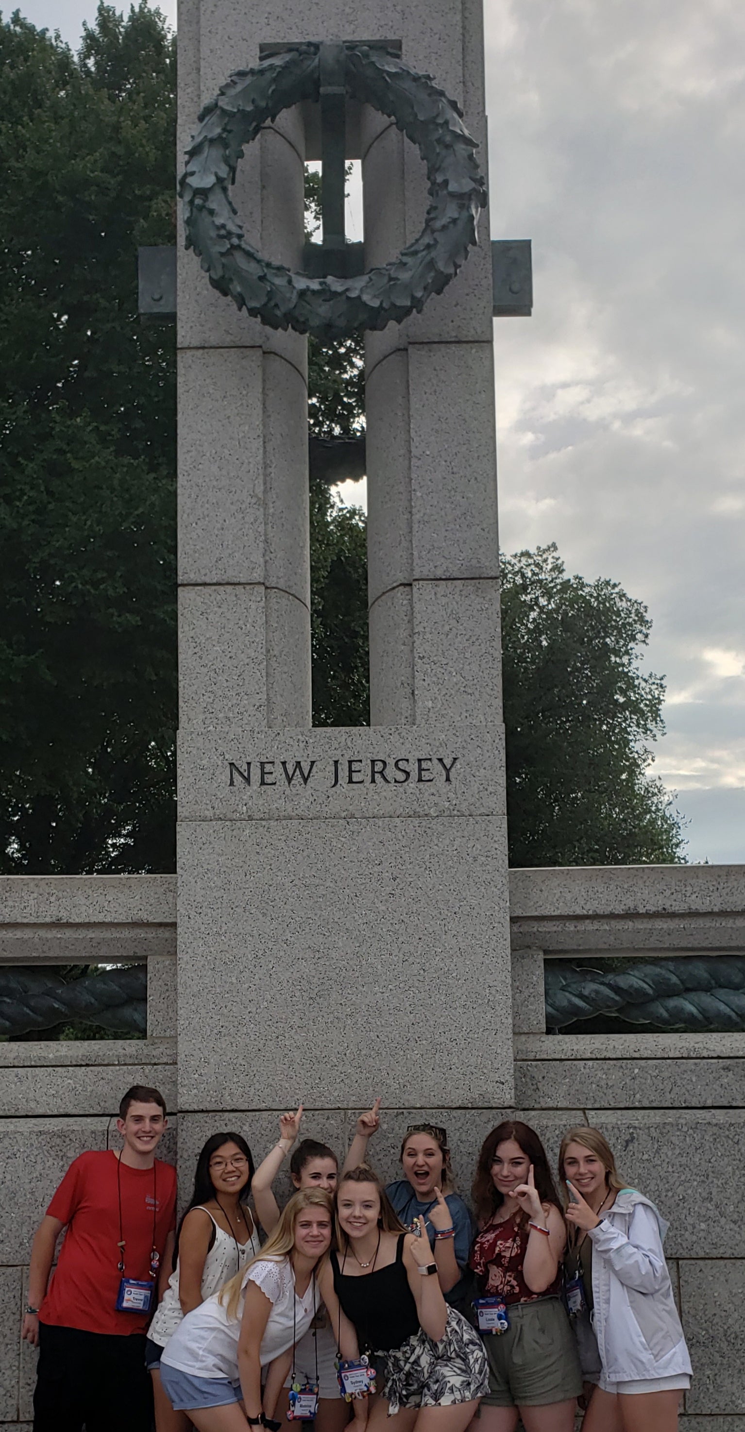 A group of New Jersey students on Youth Tour in 2019 pose in front of the New Jersey monument in Washginton, D.C.