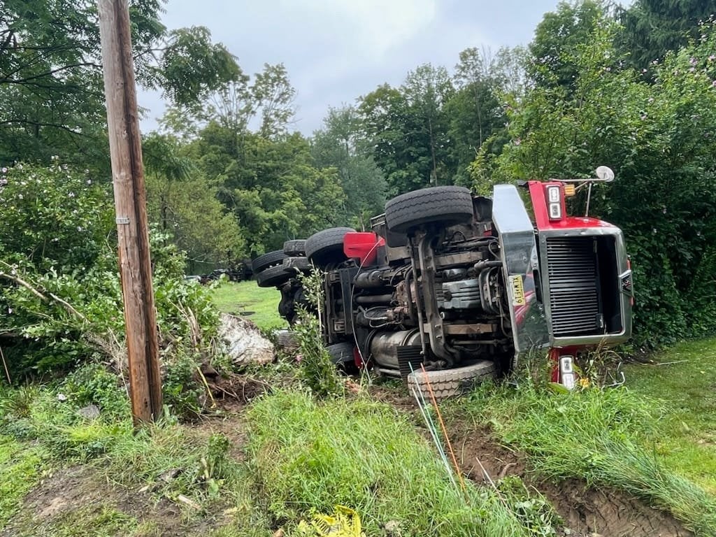 An overturned dump truck which caused an outage